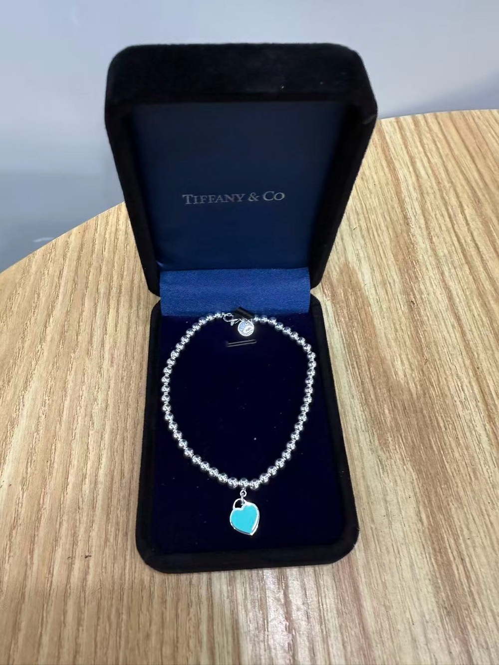Tiffany & Co. . Sterling Bead Bracelet with Blue Heart Charm